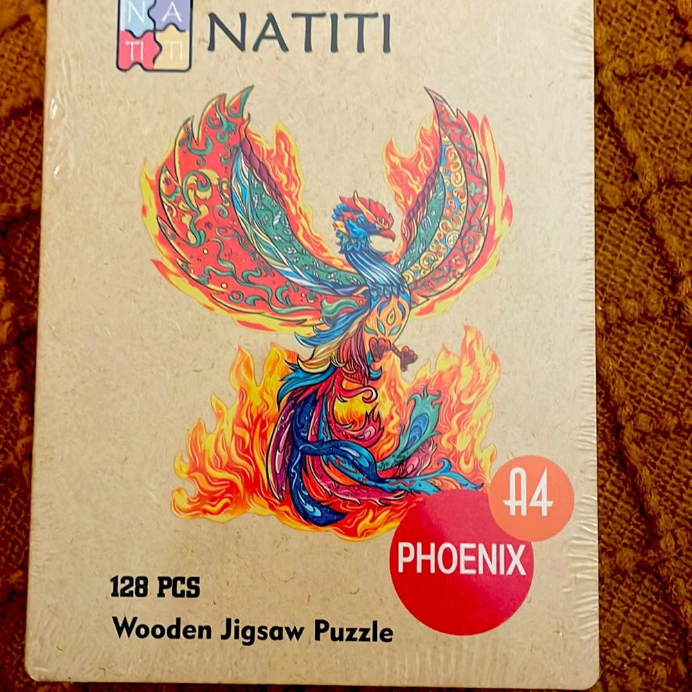 128 pieces Wooden puzzle of a Phoenix.